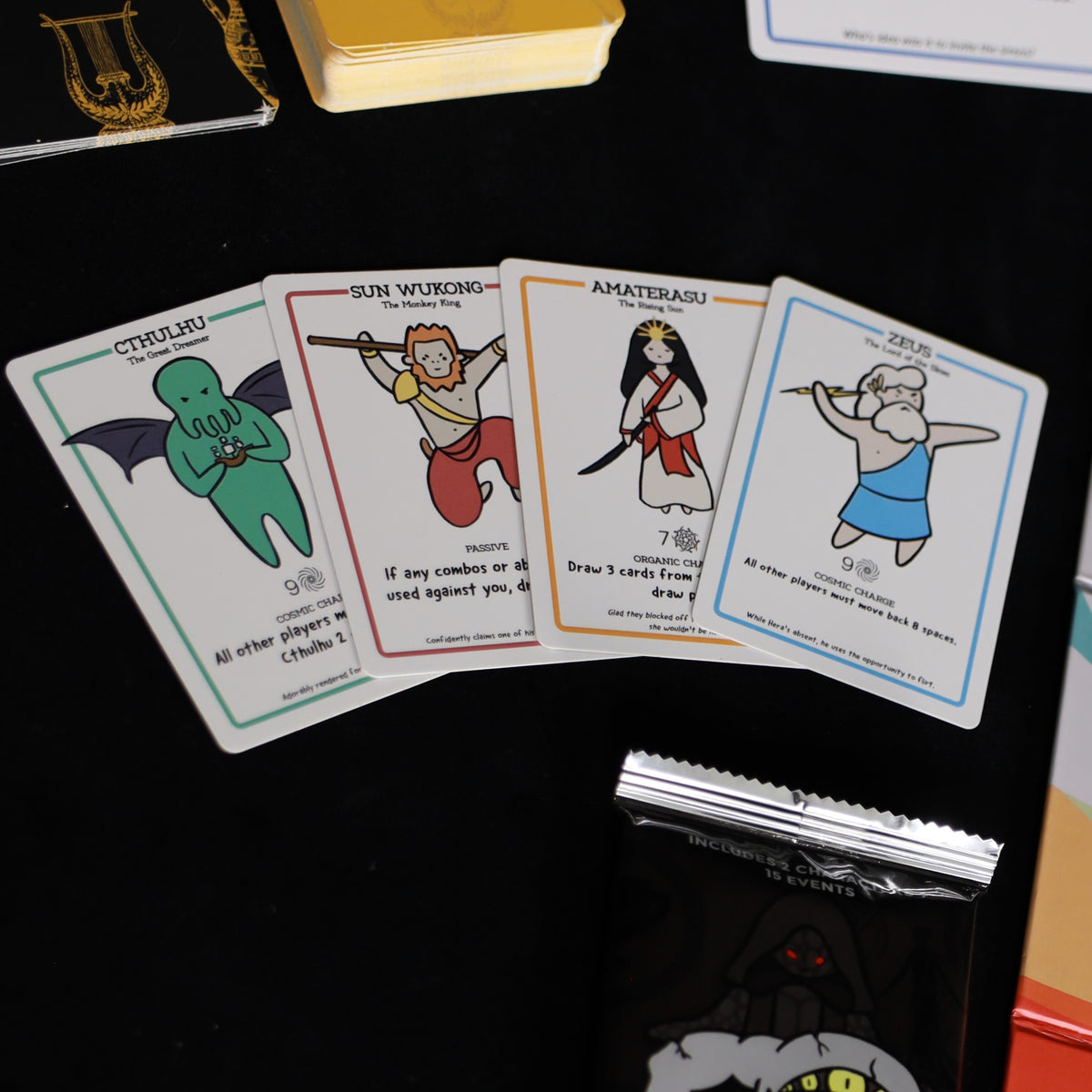 Cthulhu, Sun Wukong, Amaterasu, and Zeus god cards from God Gauntlet